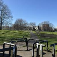 Continue ahead along the path and look right for an entrance past the barriers into City Stadium Park.