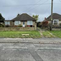 Cross Wellow Way using the drop kerbs and turn left along the pavement.