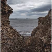 We found this gap in the rocks that leads to the beach but is rather steep and slippery.