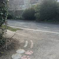 Exit the car park and turn left onto Crown Rd.