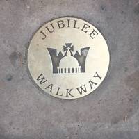 Also look for the gold pavement disc where the late Queen Elizabeth II unveiled the panel in celebration of her Golden Jubilee in 2002.