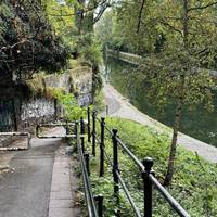 Walk down the slope to join the canal towpath just beyond the portal of the Islington tunnel.