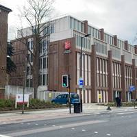 Use the crossing immediately after you come out of Denmark Hill station and turn right past the Salvation Army HQ