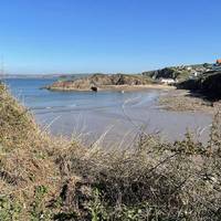 Get ready for views and more views as you start the climb up the headland. Here you can see across to Harbour Beach.