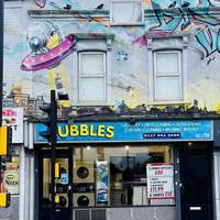 This walking tour starts at Bubbles. Which is another brightly coloured building as well as a launderette.