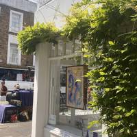 Walk straight down Portobello Road until you reach J/M Gallery on your left. Take a look at the street markets as you go!