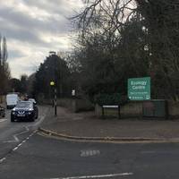 Cross West Street Lane ahead of you. Get ready to cross the zebra crossing on the left.