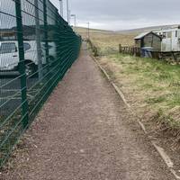 Turn left onto the path that runs up the side of the Hall car park. Almost immediately head through the field gate on the right.