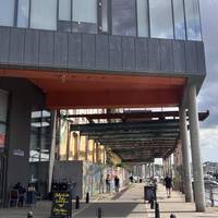 Continue ahead as the footway bears left, past some bollards, and turns into Albion Wharf. Jerwood DanceHouse is on your left.