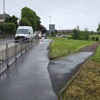 Just past the roundabout, head off to the path on the right through the grass, taking you slightly away from the main road.