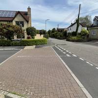 Cross the side road of Sheppards Walk and continue ahead for a short distance.