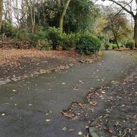 Turn right on the path along the top edge of the park. The gently undulating path is initially edged by stones.