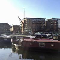 You’ll see Limehouse Basin immediately on your right. Follow it round and enjoy the view. 
