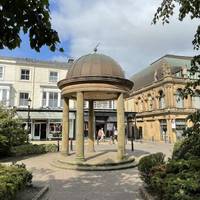 Walk through the small Victoria Gardens and around the little temple folly.