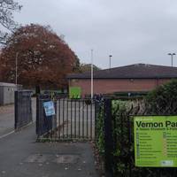 Go through the black gates and follow the footpath into the park.