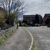 Turn right into Two Mile Court, marked as a private road.