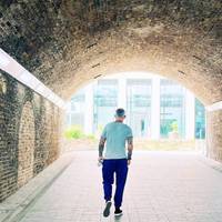 Walk through Arch 42 towards the US Embassy building.