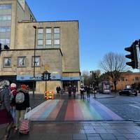 Cross Newgate at the lights, which have the pride flag colours painted onto the road.
