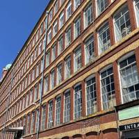 Walk past Broadstone Mill on your right