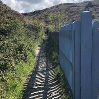 Follow the footpath which runs to the side of Blue Hills Tin Mine.
