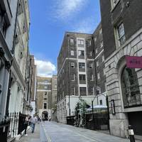 Walk along New Street, passing the old Fish Market.