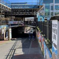 Turn immediately left again onto Trafalgar Street heading underneath the train station bridge.