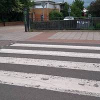 Cross on the  zebra crossing and walk straight over into Wellington Rd.