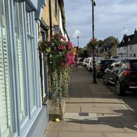 Head north up the High St. away from the shops.
