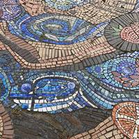 There are beautiful mosaics decorating the pavement here too.