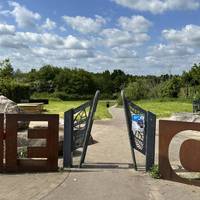 Make your way through the ornate entrance gate to enter the country park from Alwyn Road.