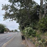 Continue along Leigh Avenue and look out for a passageway on the right.