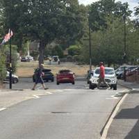 There is a zebra crossing on West Heath Road by the Coop