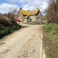 Turn left on the farm lane from car park look on your right you  see this the ye old Winnianton Farmhouse a proper Cornish dairy farm 