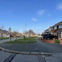 With your back to the library, head right to cross Harden Road and walk along Stockwood Road until you see a side road on the opposite side.