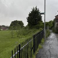 Find the footpath at the end that is above the fields
