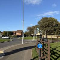 At the roundabout, follow the path around to the right.