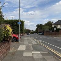 At the corner of Childwall Abbey Road, turn to your left and follow the pavement.