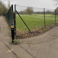 At the junction take the right turn to follow the river. There are fences either side.