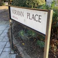Take your first left onto Norman Place, walking down the left-hand side pavement.