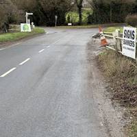 Turn right onto the main road and cross over when safe to do so. WARNING. Cars drive fast along this road so please be careful when crossing