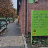 Continue straight ahead following the footpath with the Sports Pavilion on your right.