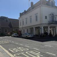 Get off the bus at the Market Place in Wallingford. Walk in the opposite direction to the church seen here. Grab refreshments if needed.