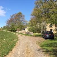 Follow the track. You will pass a stone cottage that was a former water mill in the past 