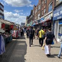 Continue along the pedestrianised East Street, which includes this street market.