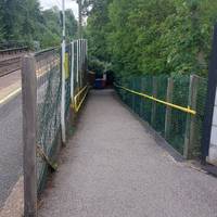 Follow the ramp and steps (if necessary) down from either platform and turn left along Bramhall Lane South.