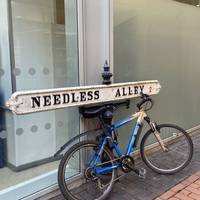 Turn left onto Needless Alley. No one knows why it’s called “Needless”. It may have originally been Needlers Alley…