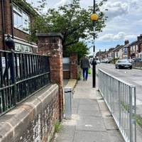 Continue ahead, past the school and at the zebra crossing, cross over Derby Road.