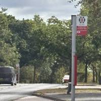 The 23 bus stops nearby on both Clapgate Lane and Woodgate Lane.