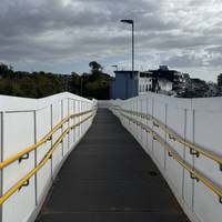 Continue down the ramp as it turns left