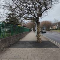 Bear left onto  Guildhall Road South. You will pass the Brangwyn Hall and Guildhall on your left.